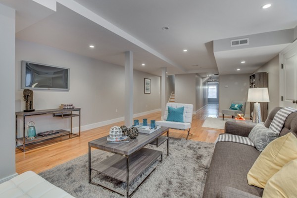 66 Perry Street, Unit 2 Brookline, MA 02446 - Photo 14 of 15 a living room with furniture and a table