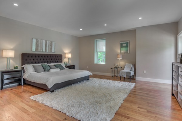 66 Perry Street, Unit 2 Brookline, MA 02446 - Photo 7 of 15 a bedroom with a bed and window