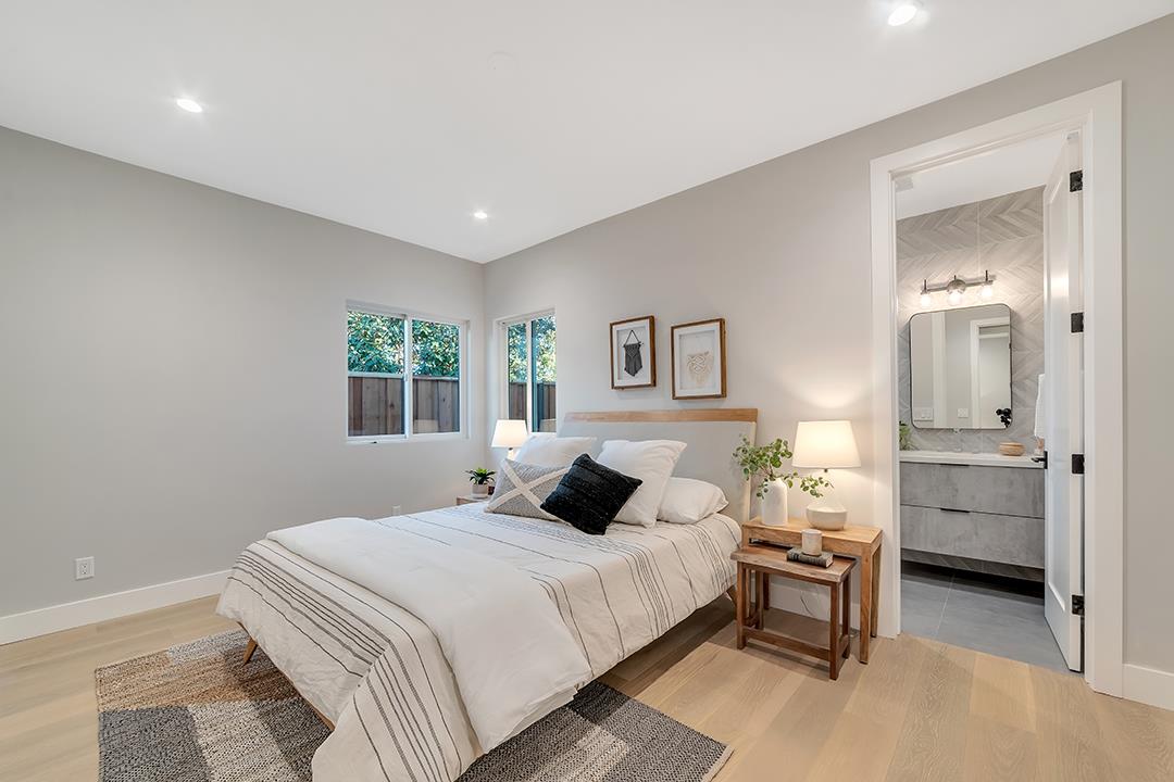 10872 West Estates Drive Cupertino, CA 95014 - Photo 12 of 58 a bedroom with a bed and a table