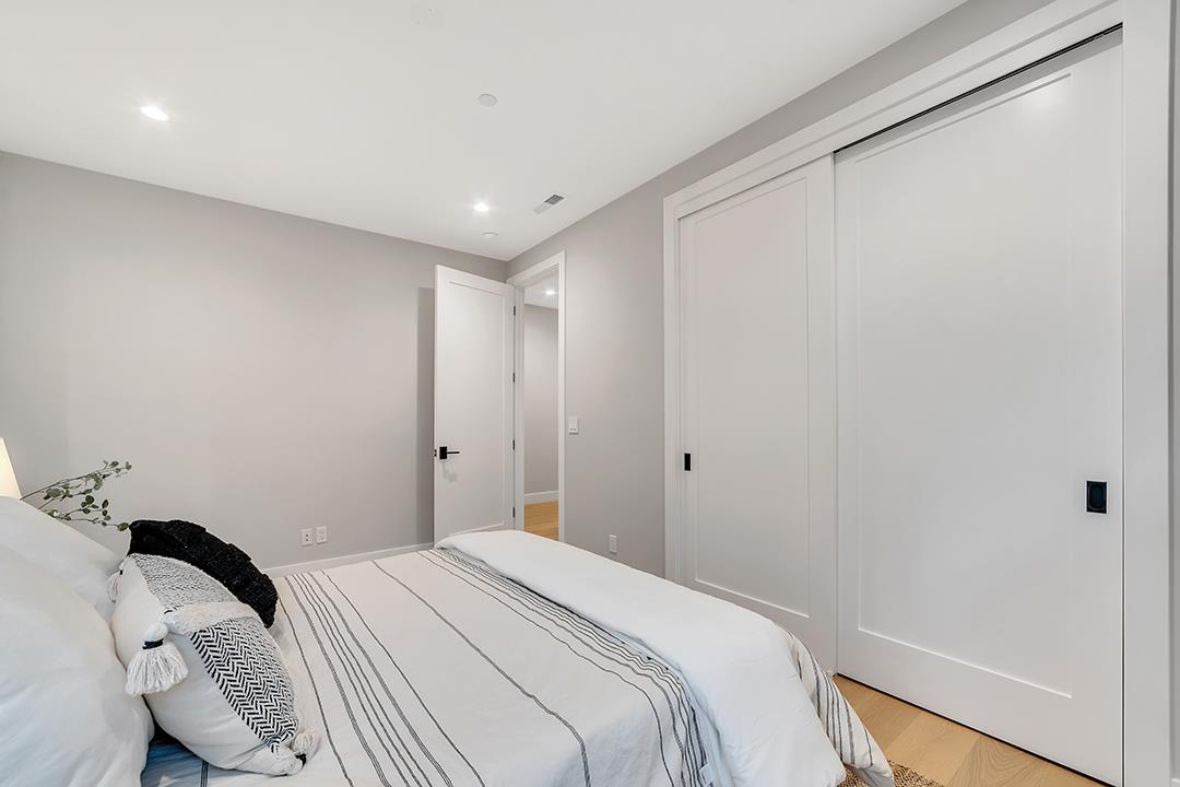 10872 West Estates Drive Cupertino, CA 95014 - Photo 13 of 58 a bedroom with a bed and a window