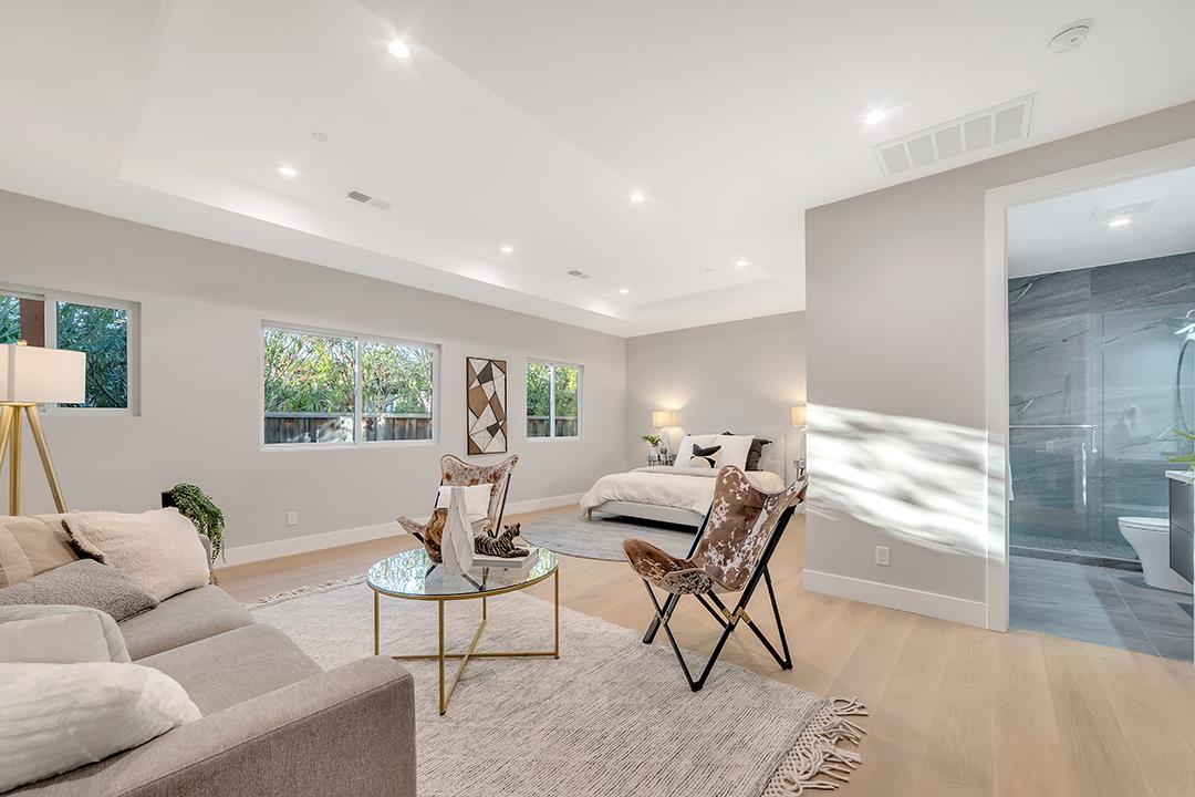 10872 West Estates Drive Cupertino, CA 95014 - Photo 16 of 58 a living room with furniture and a large window