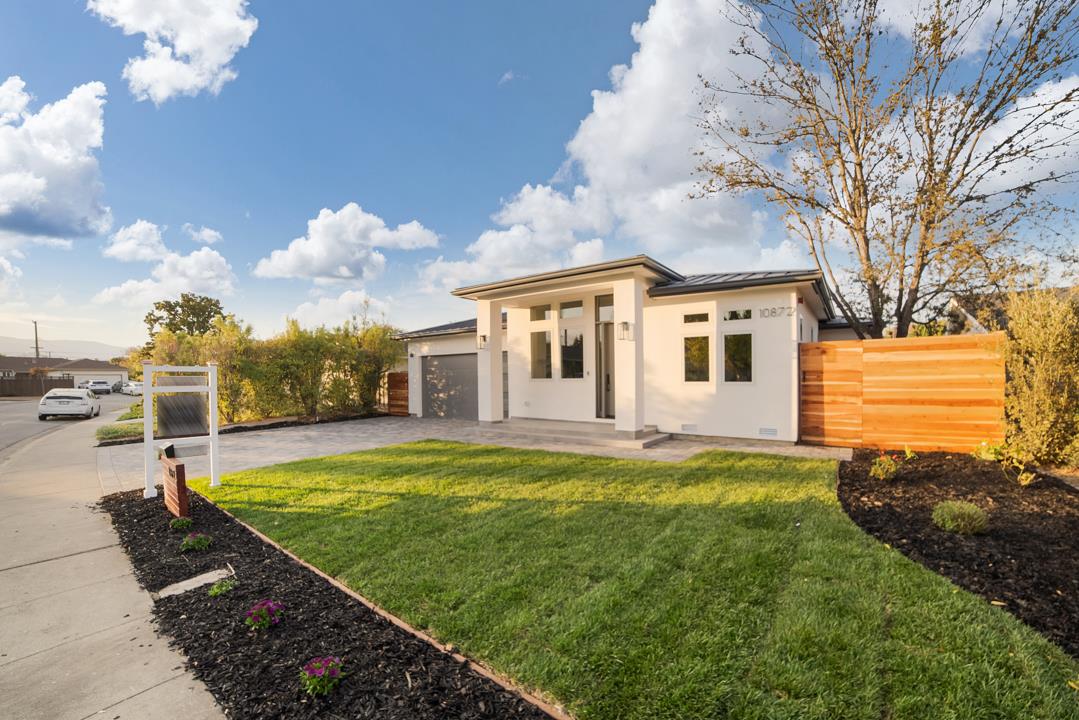 10872 West Estates Drive Cupertino, CA 95014 - Photo 2 of 58 a view of a house with swimming pool and a yard