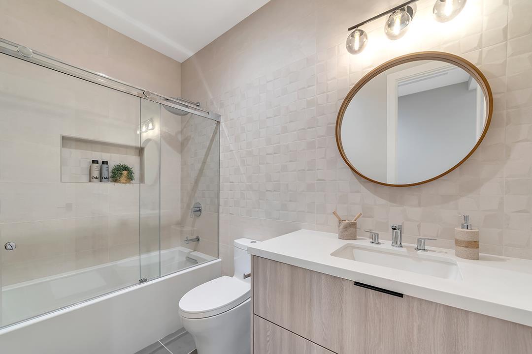 10872 West Estates Drive Cupertino, CA 95014 - Photo 21 of 58 a bathroom with a sink a toilet and a mirror