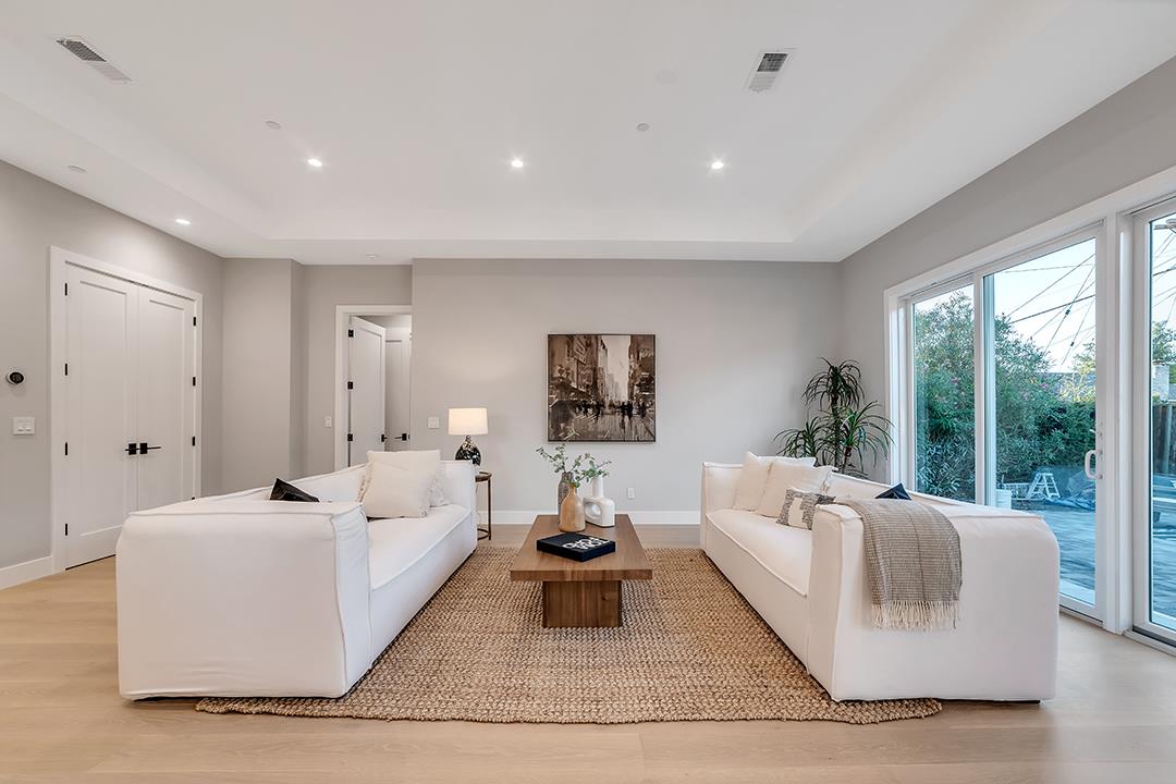 10872 West Estates Drive Cupertino, CA 95014 - Photo 25 of 58 a living room with furniture and a large window