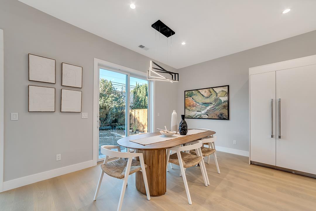 10872 West Estates Drive Cupertino, CA 95014 - Photo 28 of 58 a view of a dining room with furniture window and wooden floor