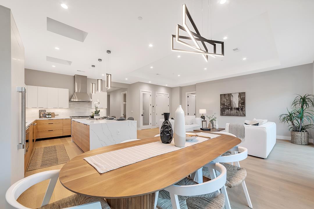 10872 West Estates Drive Cupertino, CA 95014 - Photo 29 of 58 a large kitchen with a table and chairs