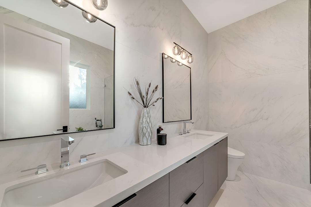 10872 West Estates Drive Cupertino, CA 95014 - Photo 35 of 58 a bathroom with a sink and a mirror