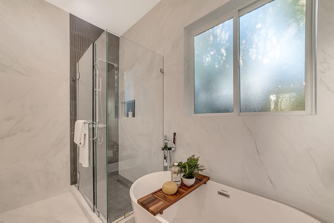 10872 West Estates Drive Cupertino, CA 95014 - Photo 36 of 58 a bathroom with a tub and shower