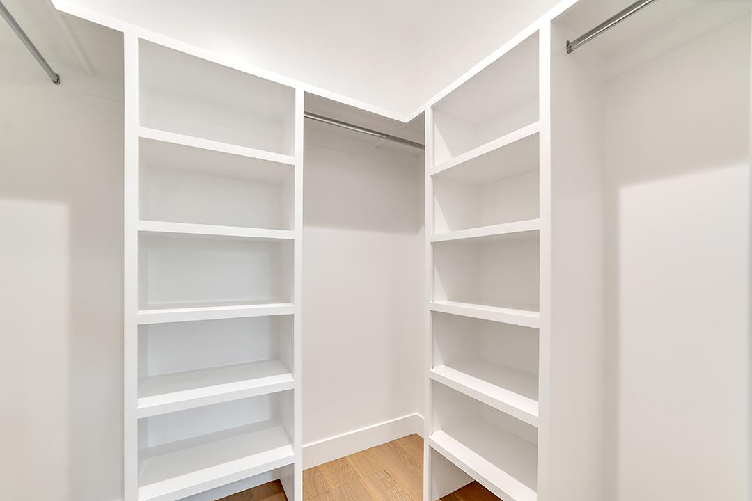 10872 West Estates Drive Cupertino, CA 95014 - Photo 37 of 58 a view of walk in closet with empty racks