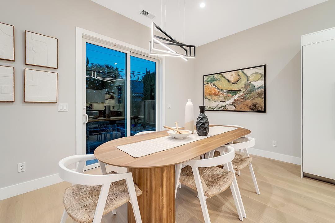 10872 West Estates Drive Cupertino, CA 95014 - Photo 48 of 58 a view of a dining room with furniture and wooden floor