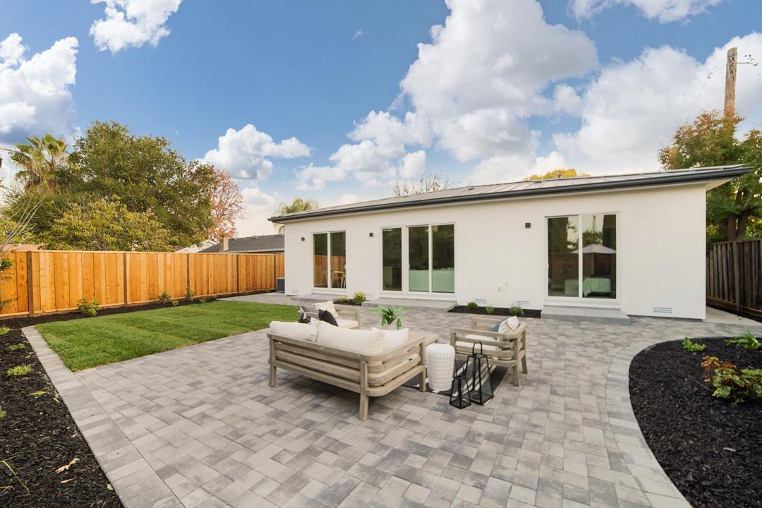 10872 West Estates Drive Cupertino, CA 95014 - Photo 53 of 58 a view of a house with backyard and sitting area