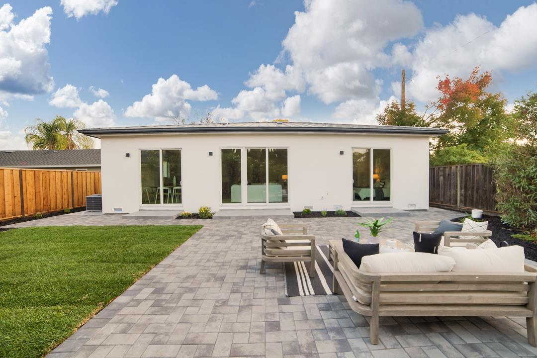10872 West Estates Drive Cupertino, CA 95014 - Photo 54 of 58 a view of a house with backyard and sitting area