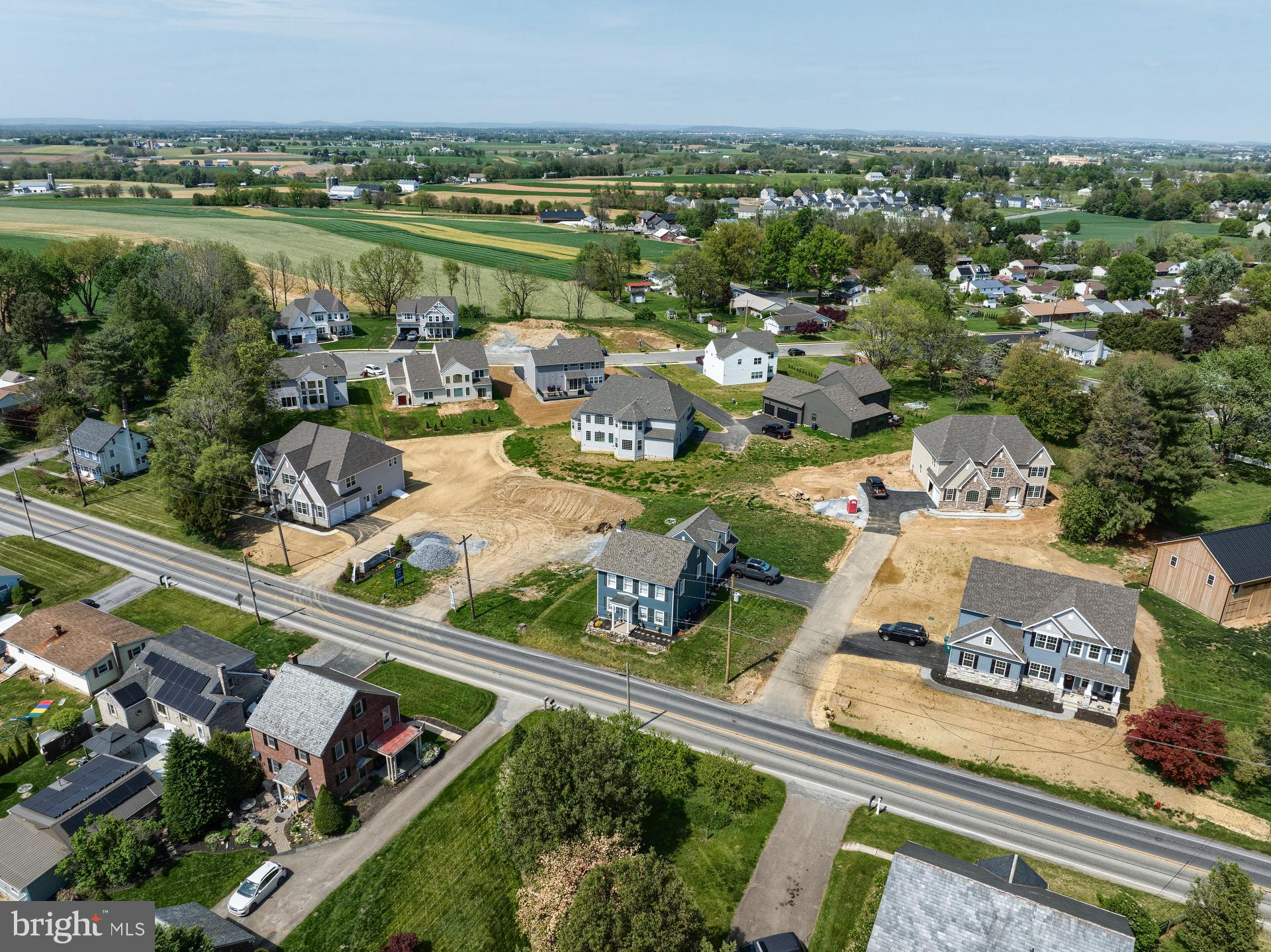 350 Village Road, Unit ARCADIA Strasburg, PA 17579 - Photo 16 of 19 an aerial view of a residential houses with outdoor space and street view