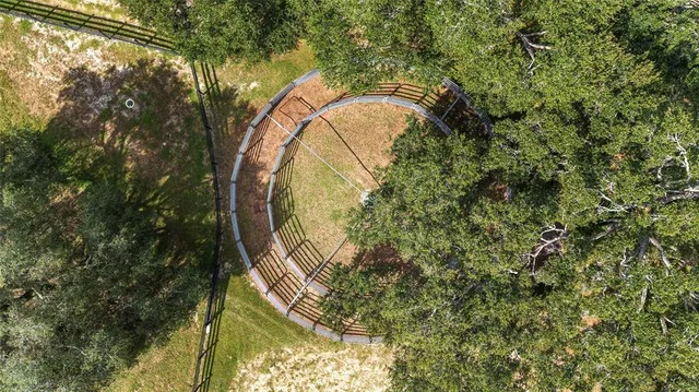 a bathroom with a bathtub a sink and a mirror