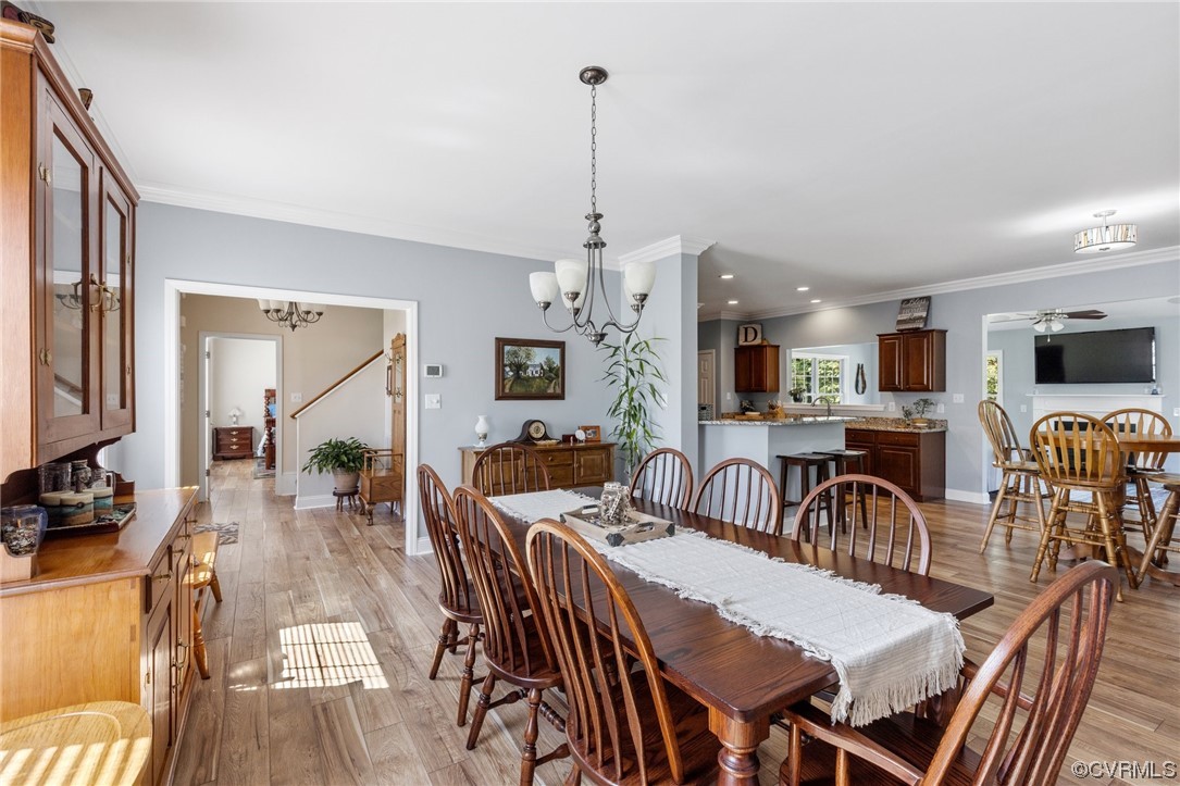 12811 Riverway Road Chesterfield, VA 23838 - Photo 9 of 50 a view of a a dining room with furniture window and wooden floor