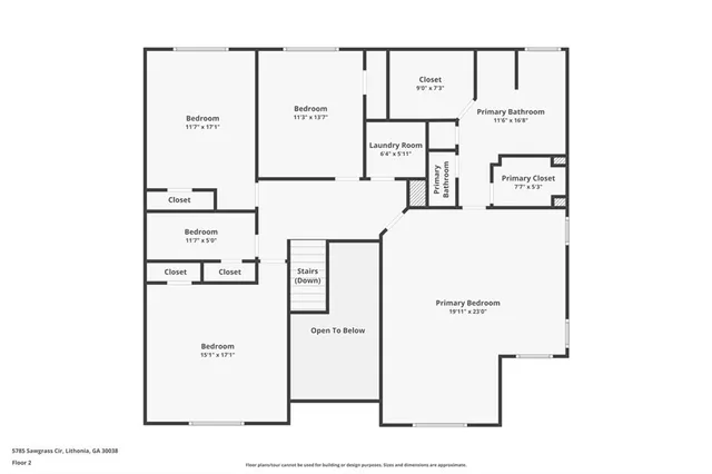 a view of a house with a yard and plants