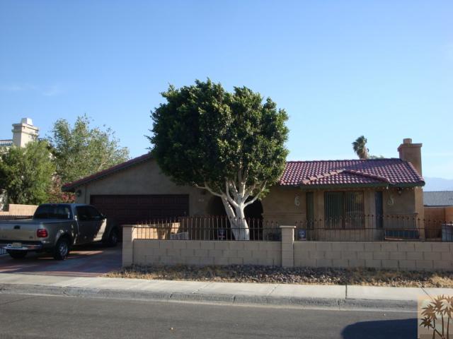68205 Encinitas Road Cathedral City, CA 92234 - Photo 1 of 8 a front view of a house with a garage