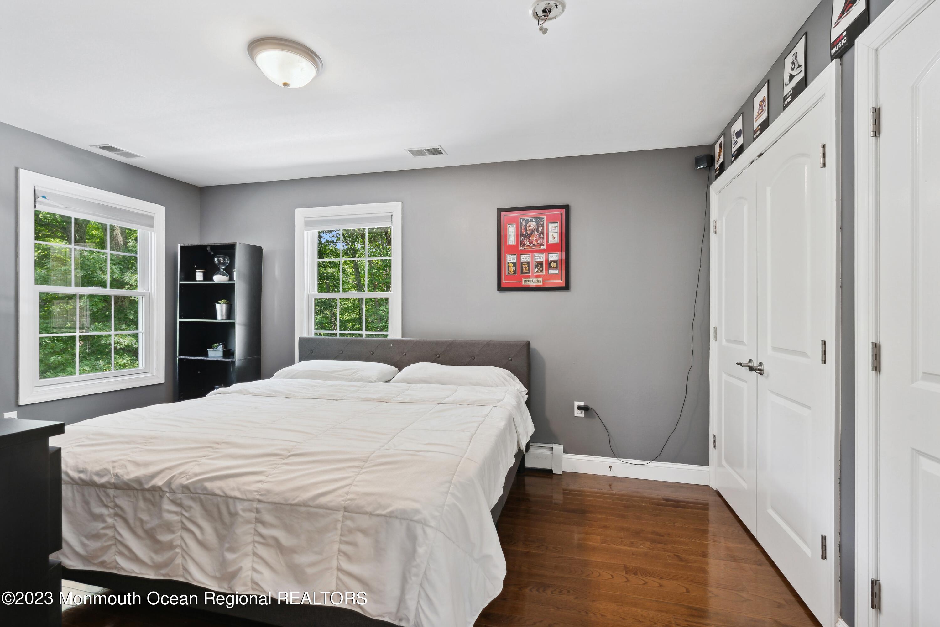 70 Bates Road Jackson, NJ 08527 - Photo 22 of 33 a bedroom with a bed and a window