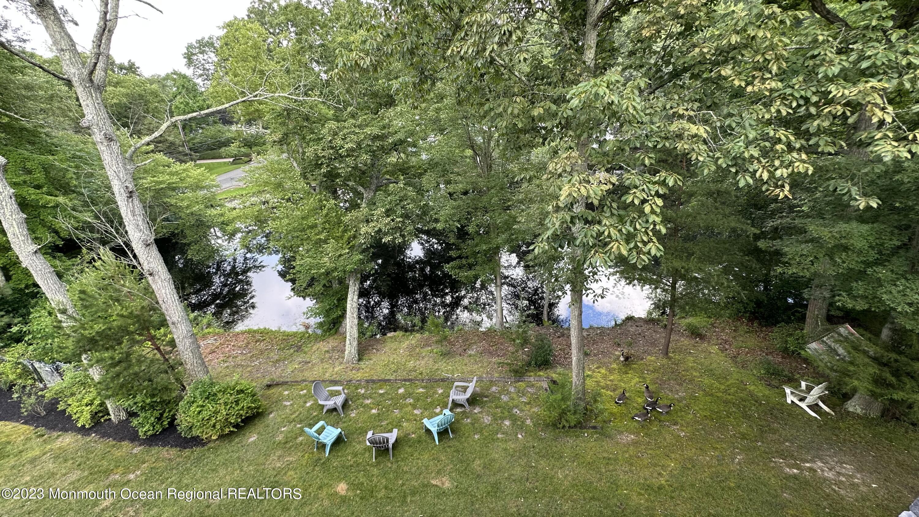 70 Bates Road Jackson, NJ 08527 - Photo 5 of 33 a backyard of a house with lots of green space
