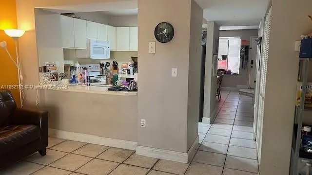 a living room with granite countertop furniture and a window