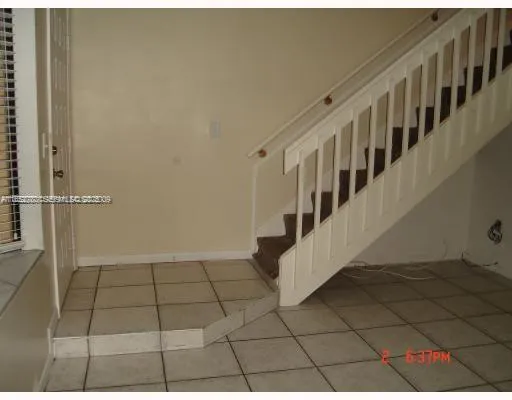 a view of swimming pool from a lake view