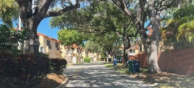 a view of a yard with plants