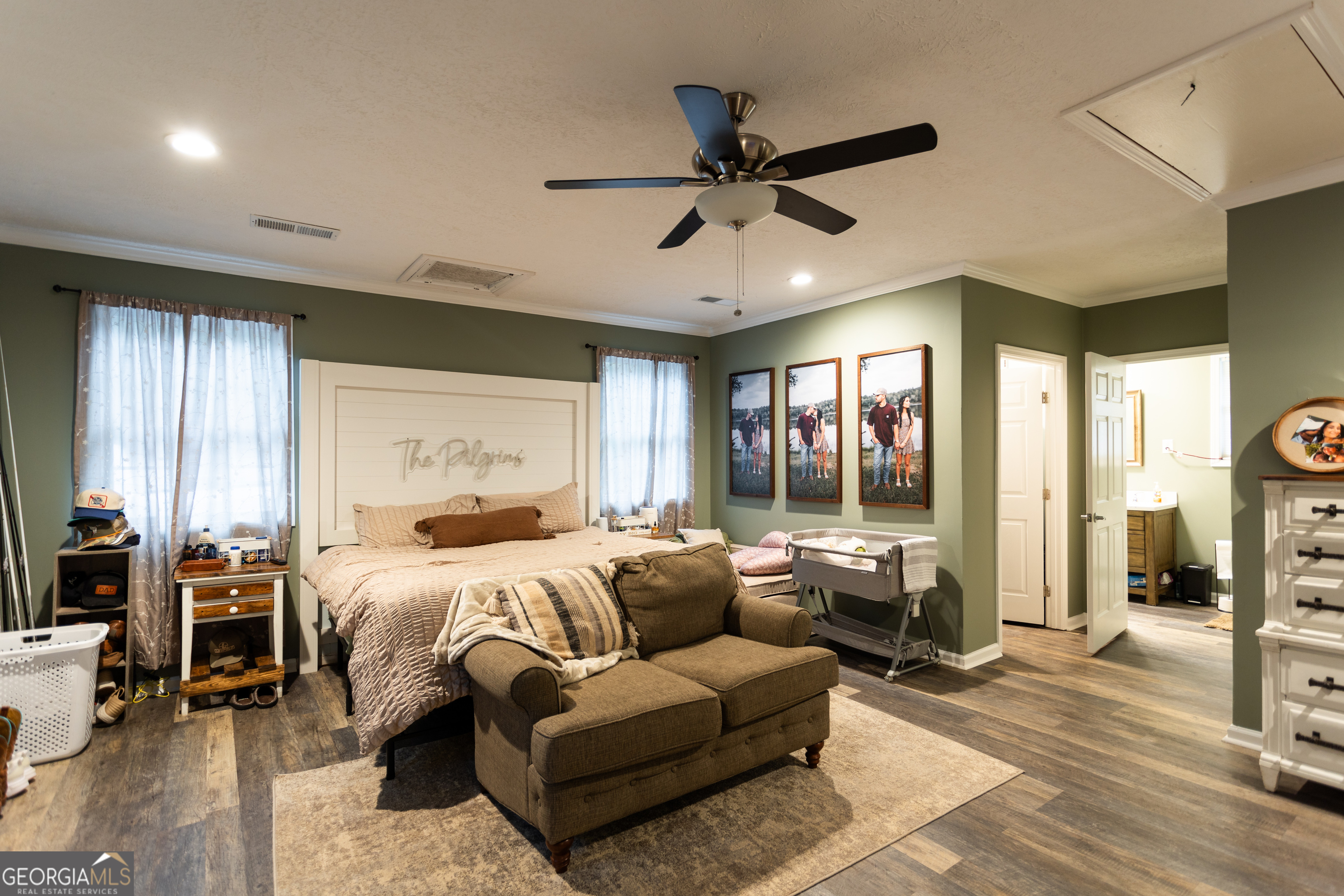 1585 Flat Rock Road Covington, GA 30014 - Photo 17 of 48 a bedroom with furniture and a large window