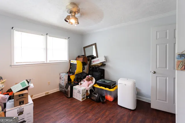 a room with furniture and wooden floor