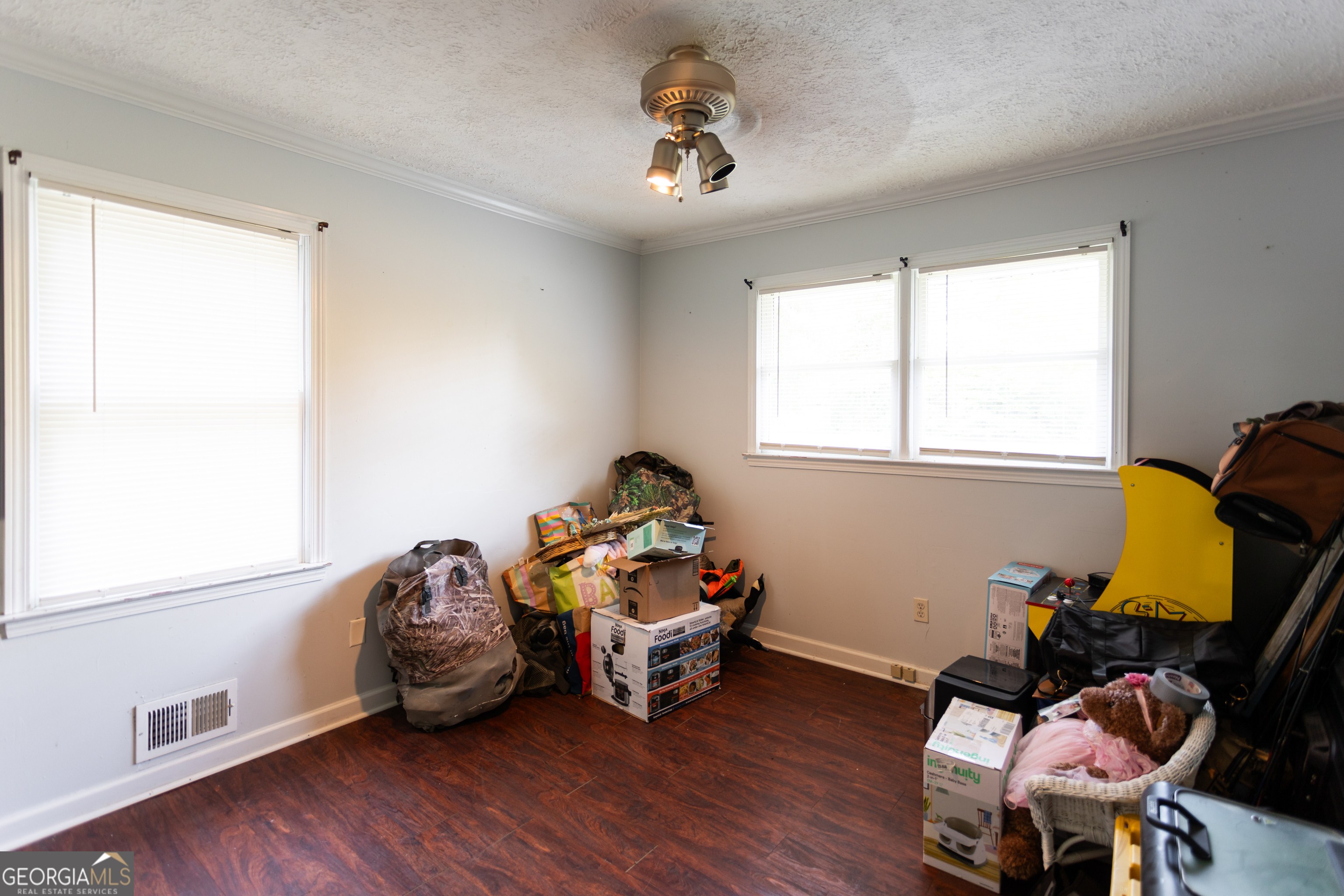 1585 Flat Rock Road Covington, GA 30014 - Photo 22 of 48 a bedroom with furniture and a window