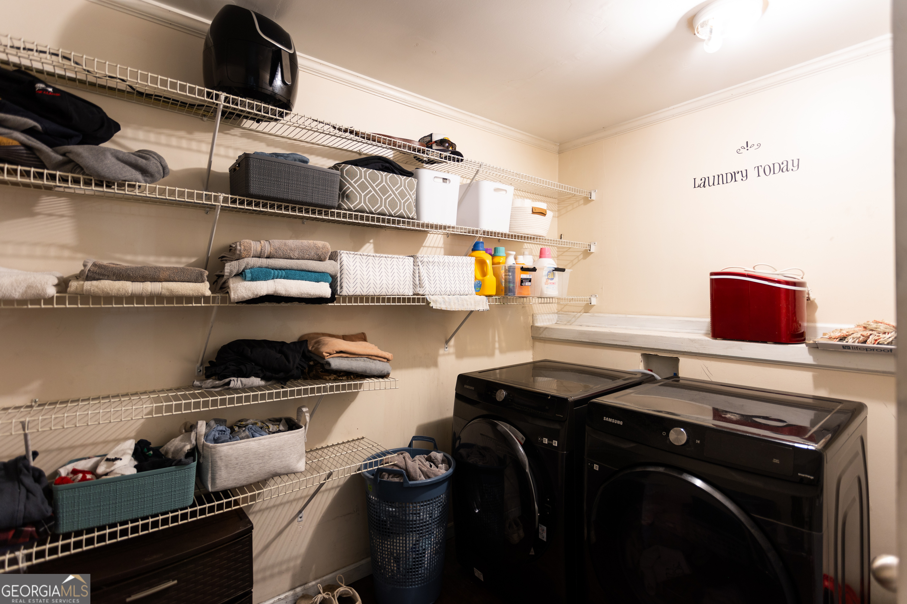 1585 Flat Rock Road Covington, GA 30014 - Photo 30 of 48 a kitchen with a stove and cabinets