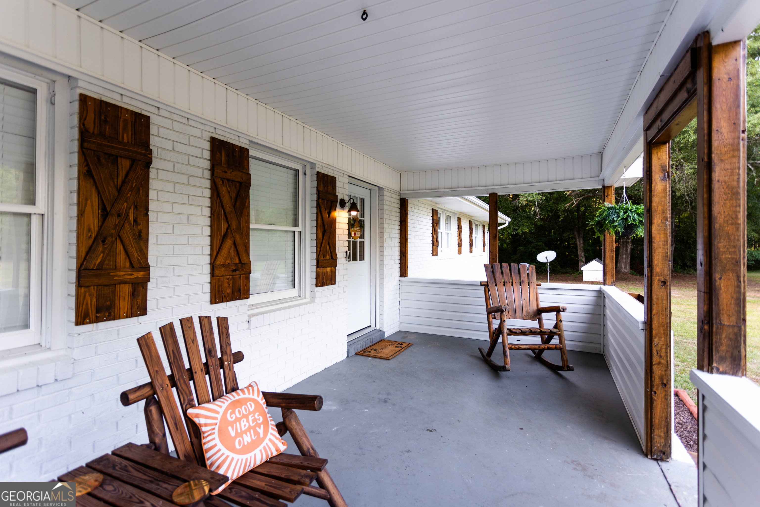1585 Flat Rock Road Covington, GA 30014 - Photo 3 of 48 a view of living room filled with furniture and large window