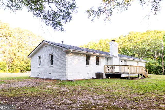 a house view with a garden space