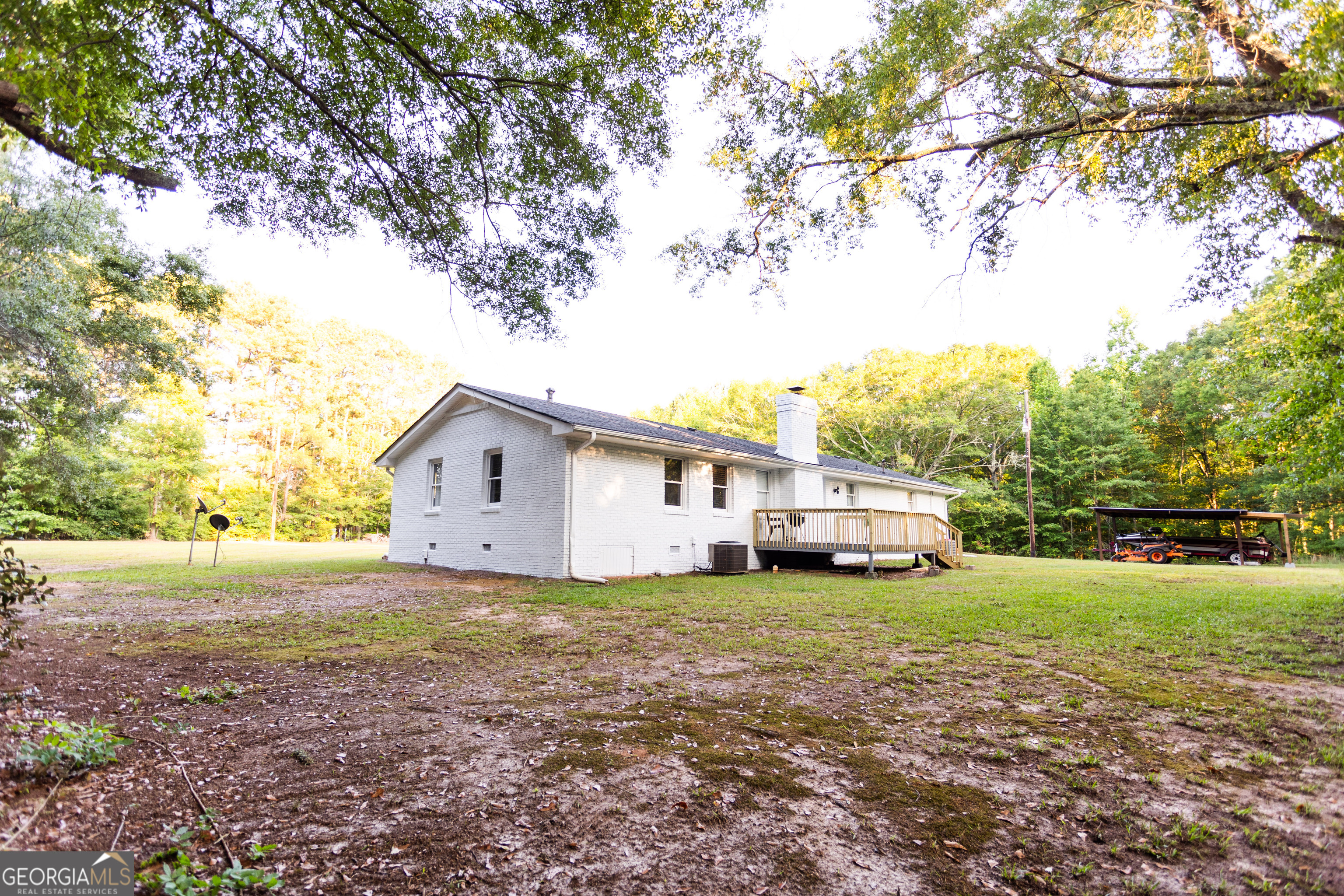 1585 Flat Rock Road Covington, GA 30014 - Photo 35 of 48 a house view with a garden space