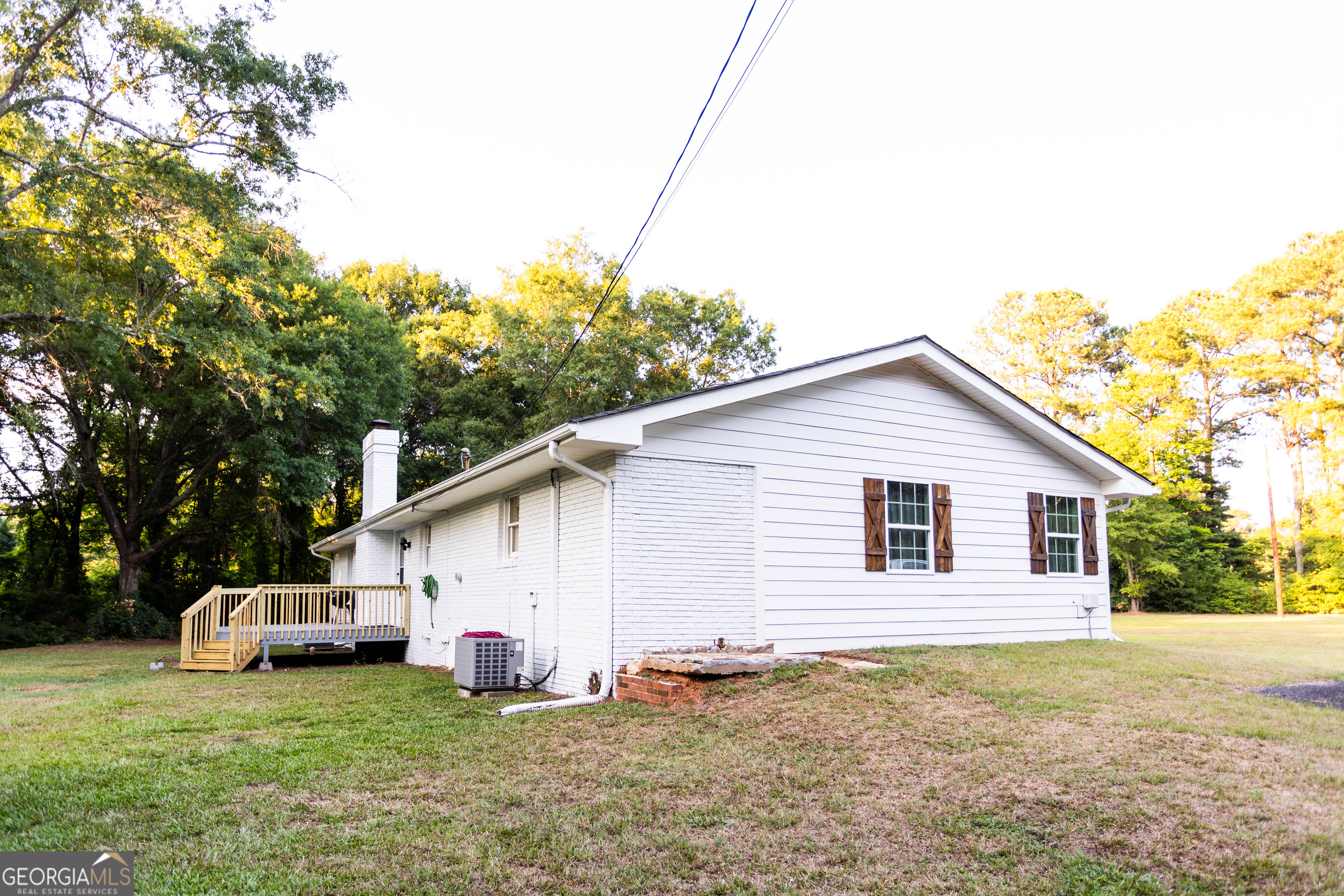 1585 Flat Rock Road Covington, GA 30014 - Photo 37 of 48 a view of a house with a yard
