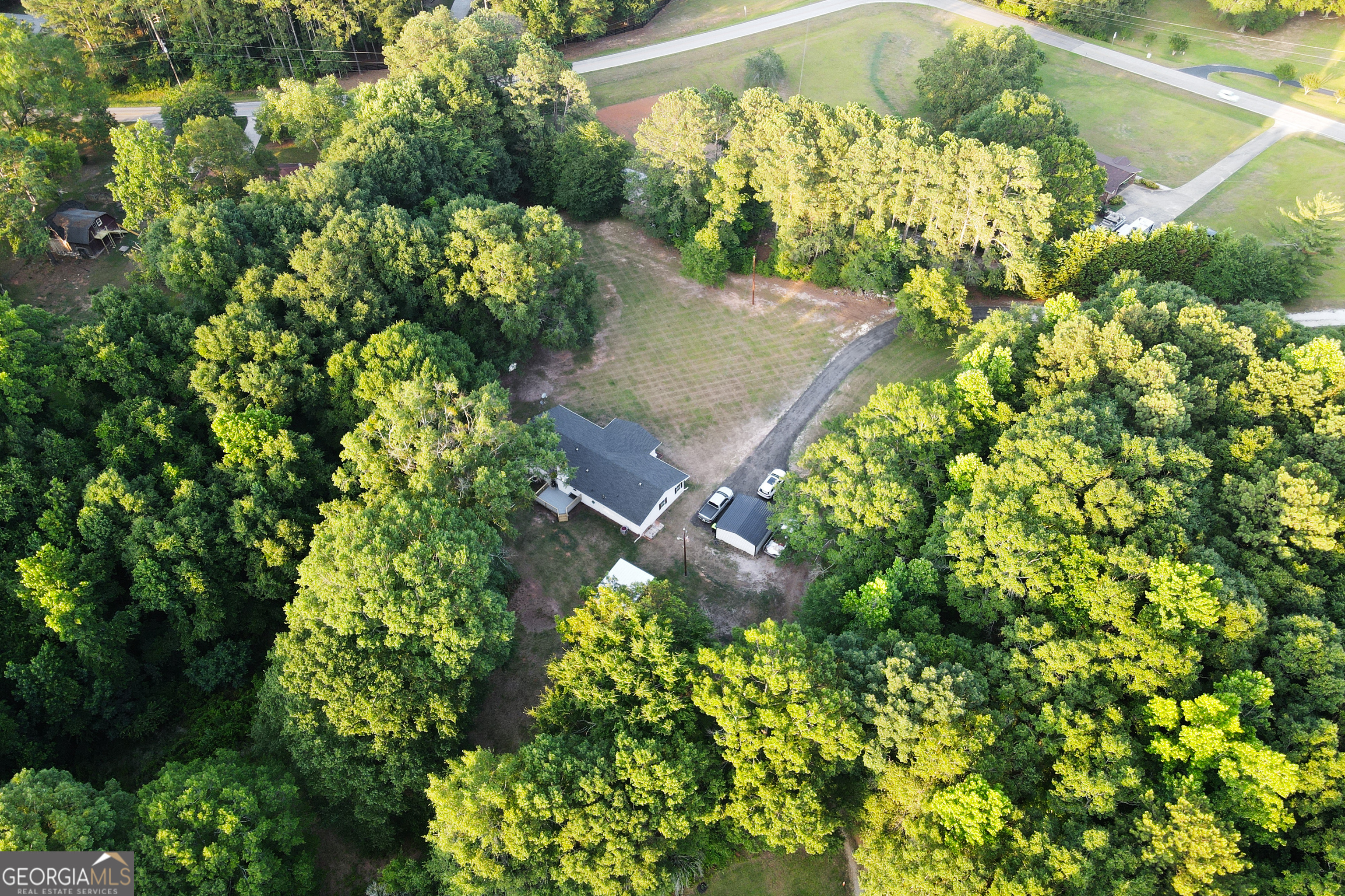 1585 Flat Rock Road Covington, GA 30014 - Photo 45 of 48 an aerial view of a house with a yard and garden