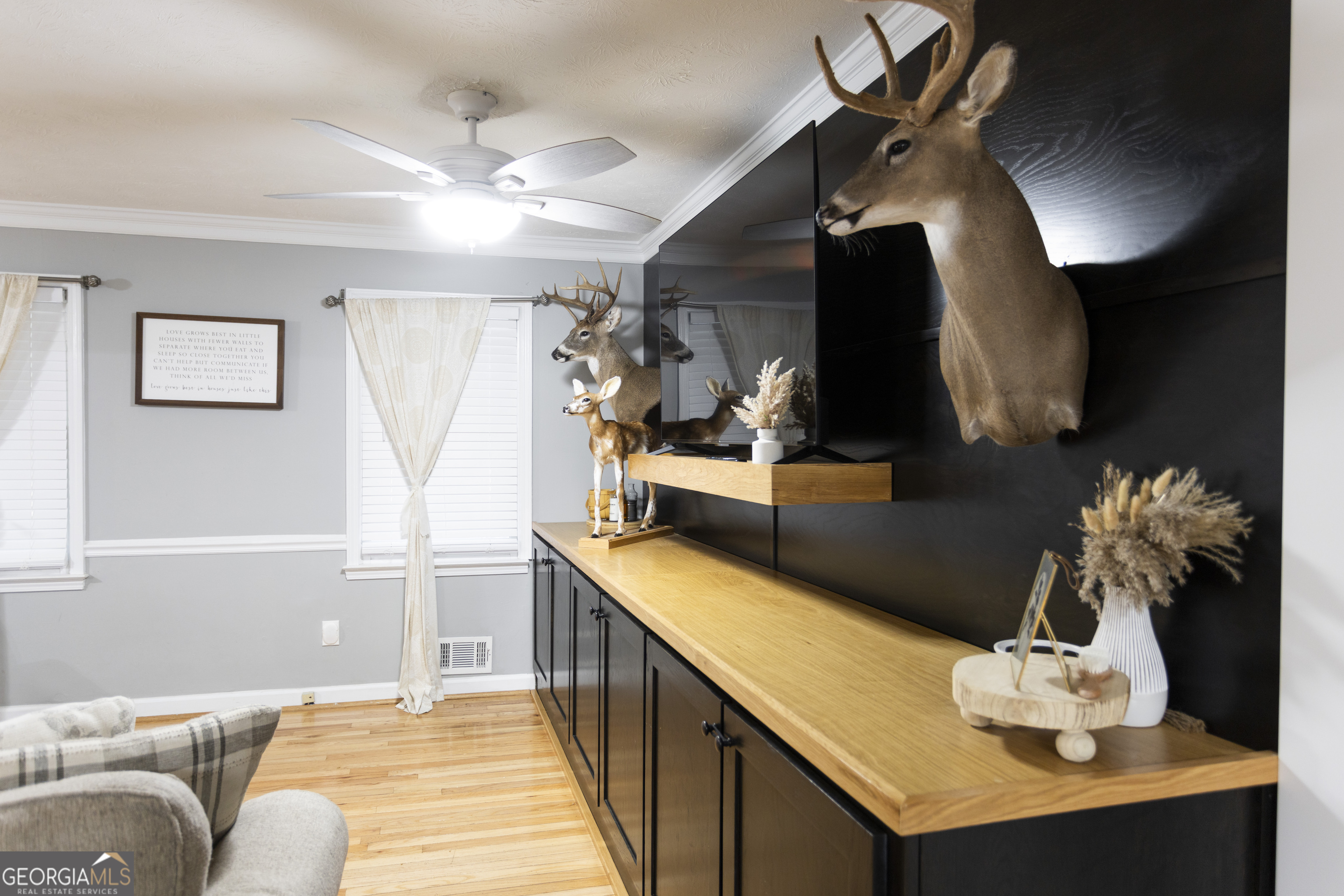 1585 Flat Rock Road Covington, GA 30014 - Photo 8 of 48 a hallway with a table and a chandelier