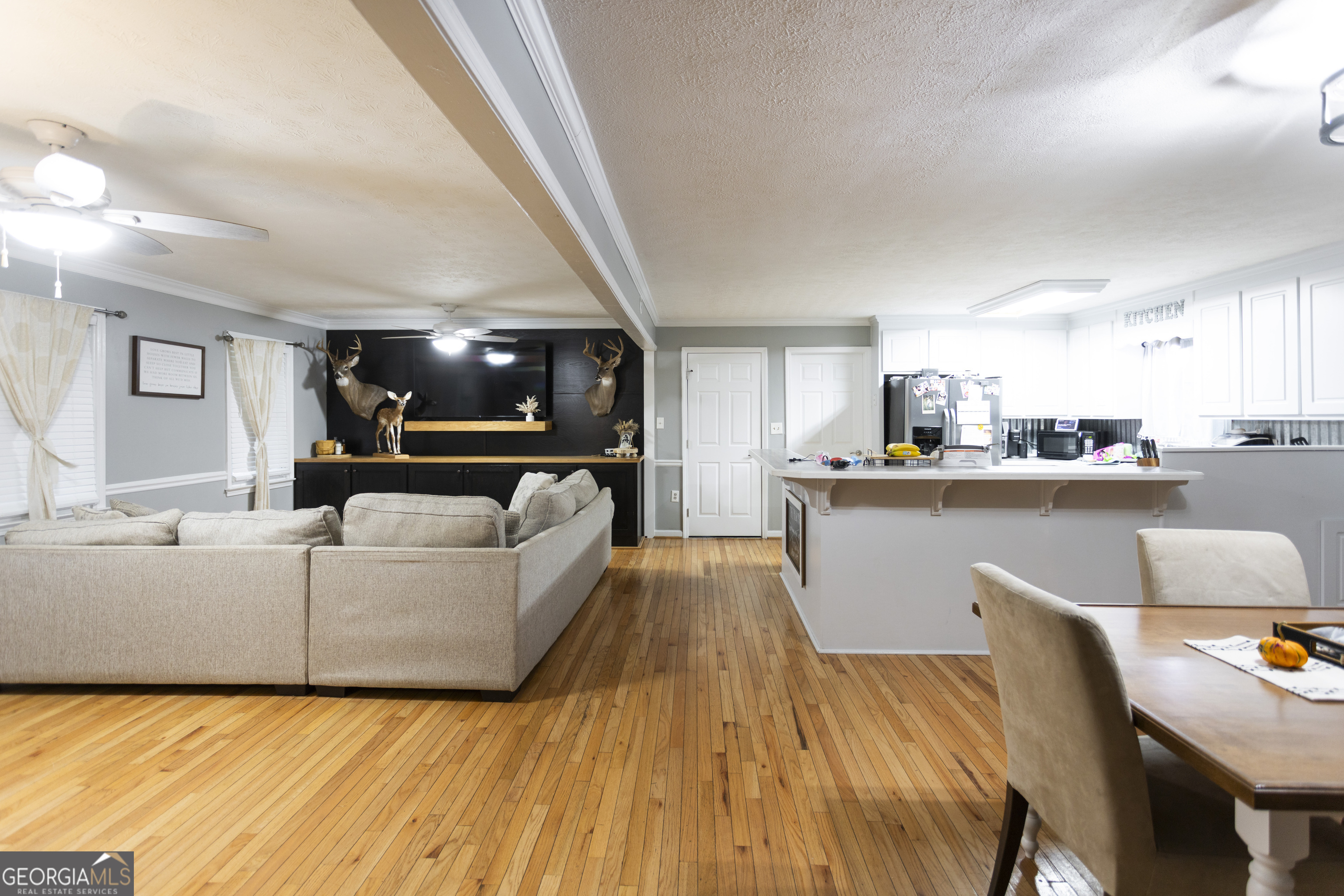 1585 Flat Rock Road Covington, GA 30014 - Photo 10 of 48 a living room with furniture and kitchen view