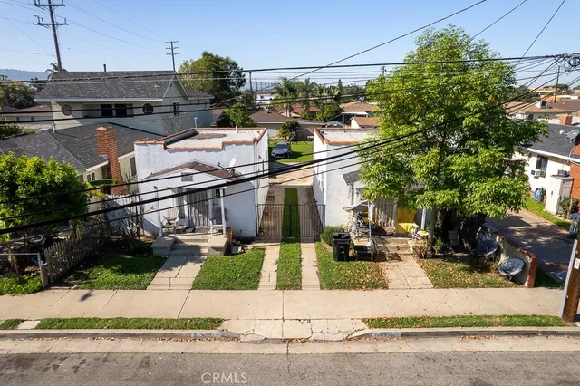 an aerial view of a city with lots of residential buildings