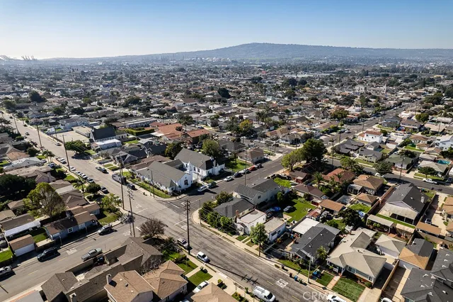 an aerial view of houses with outdoor space