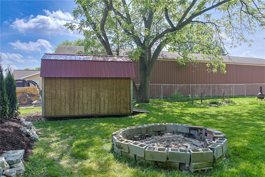 3407 State Rte 113 East Milan, OH 44846 - Photo 19 of 25 View of yard with a fire pit