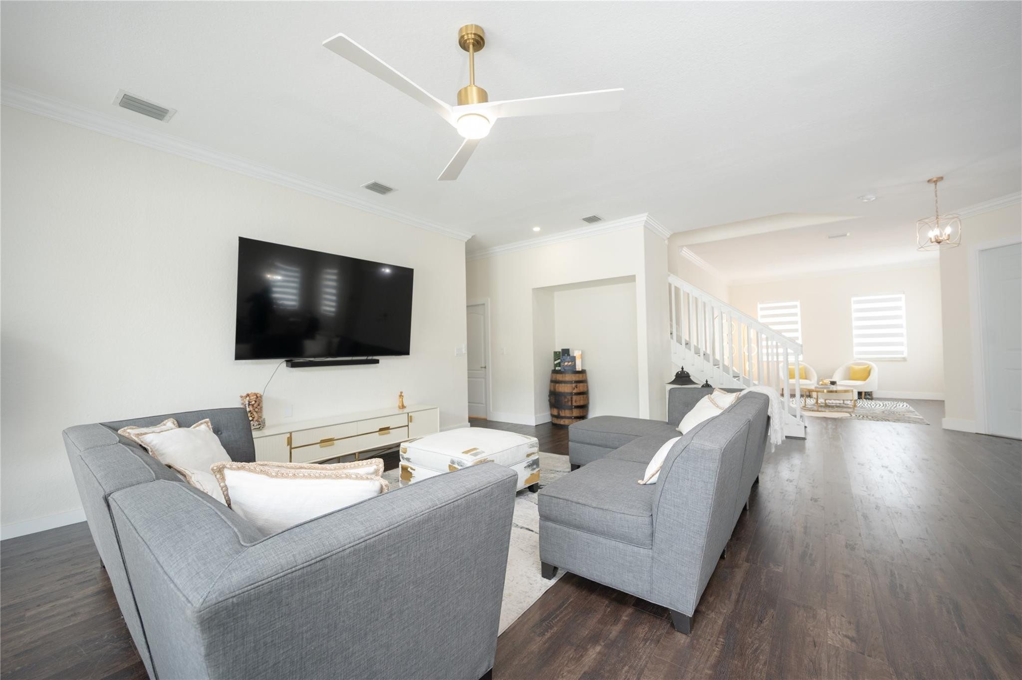 8891 Northwest 178th Lane Hialeah, FL 33018 - Photo 12 of 42 a living room with furniture and a flat screen tv