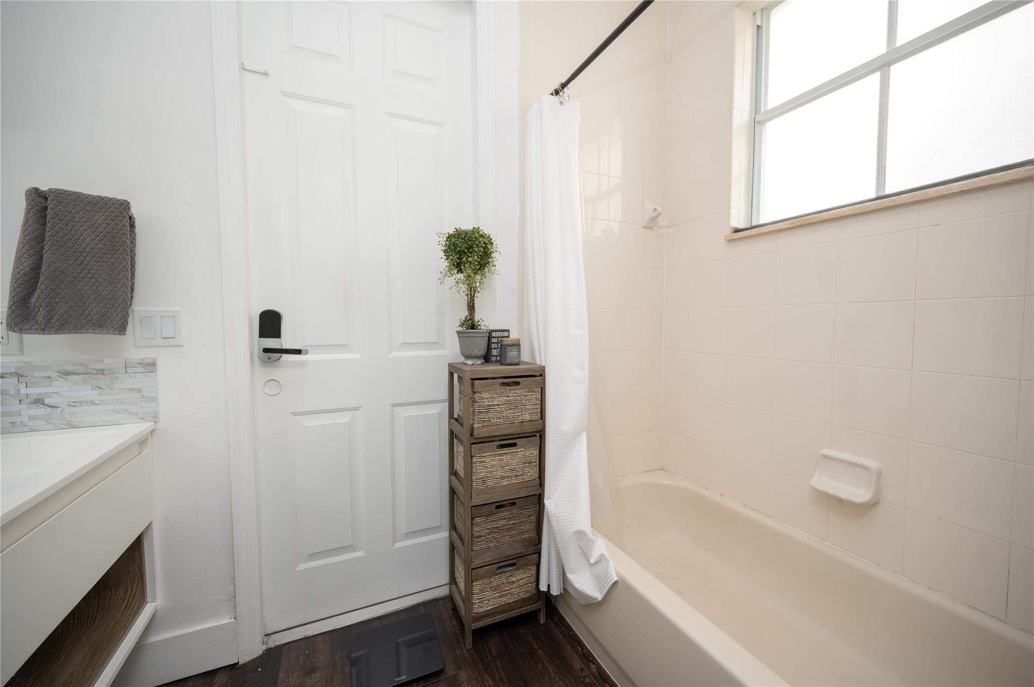 8891 Northwest 178th Lane Hialeah, FL 33018 - Photo 17 of 42 a bathroom with a bathtub and shower