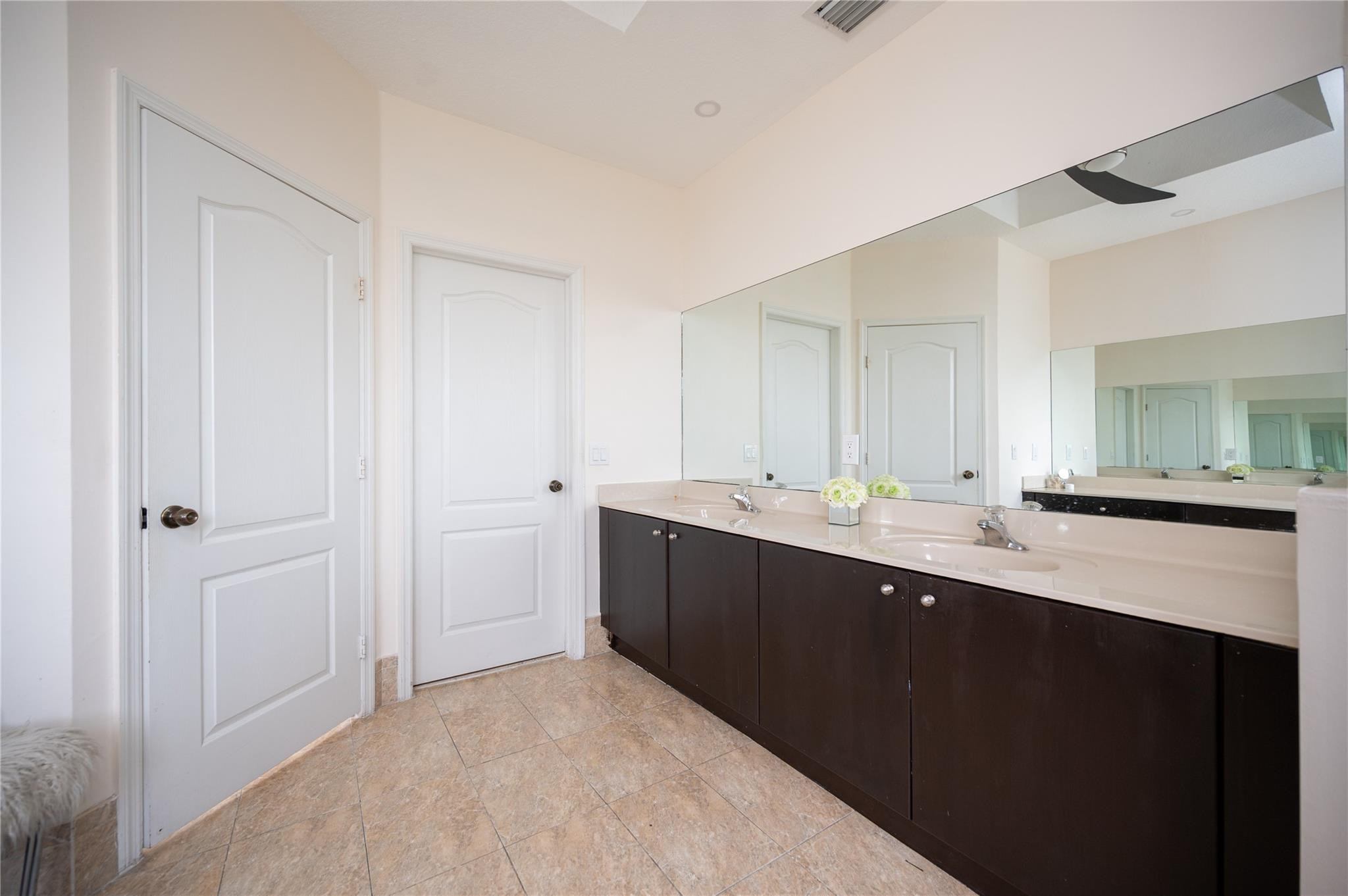 8891 Northwest 178th Lane Hialeah, FL 33018 - Photo 23 of 42 a view with two sink and a refrigerator in a room