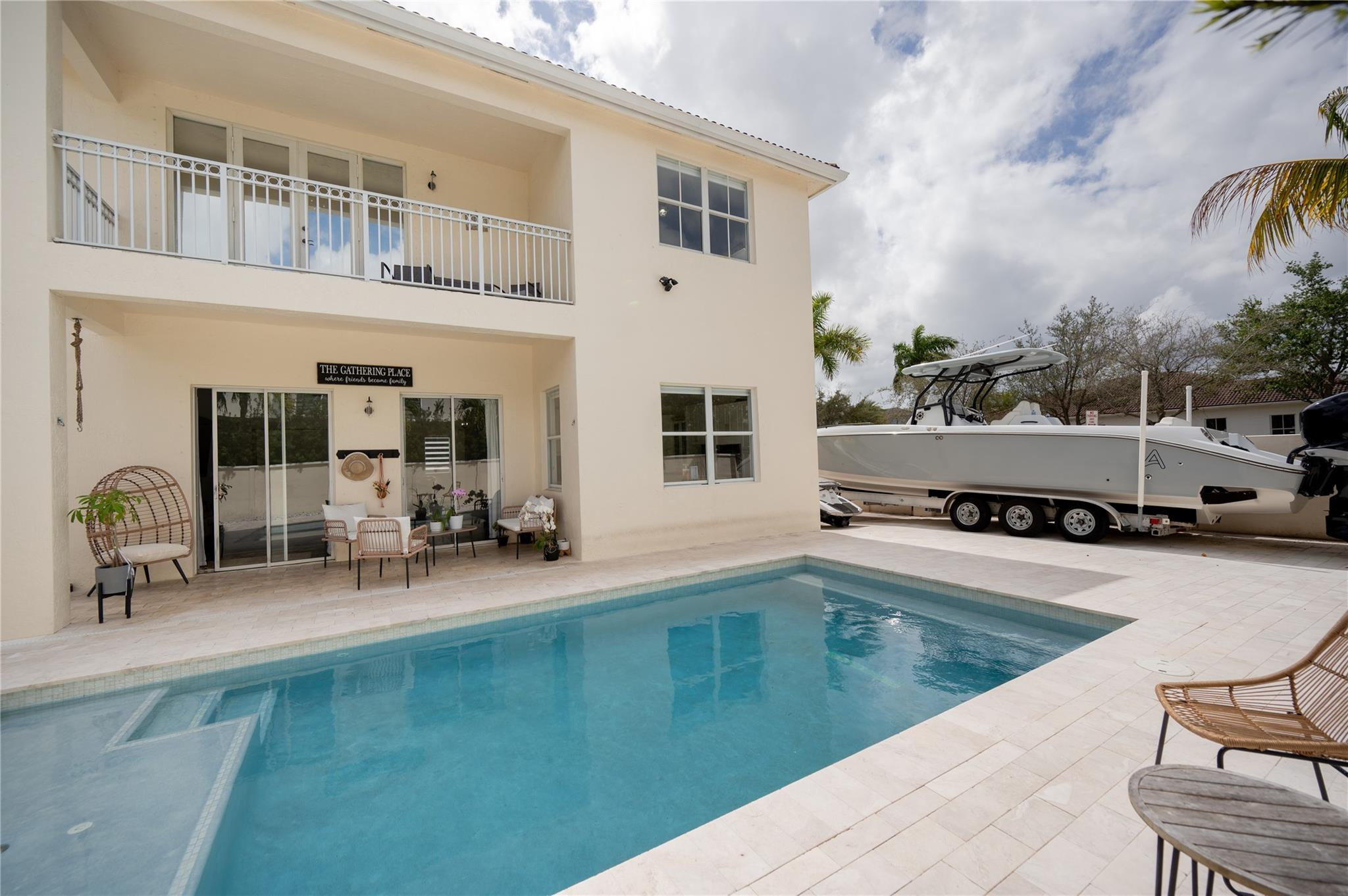 8891 Northwest 178th Lane Hialeah, FL 33018 - Photo 33 of 42 a swimming pool with outdoor seating and yard