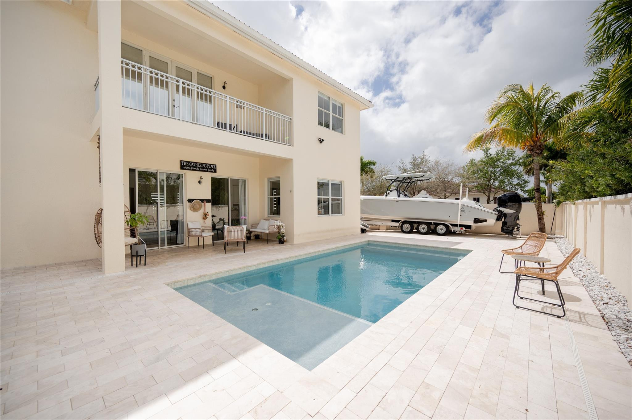 8891 Northwest 178th Lane Hialeah, FL 33018 - Photo 34 of 42 a view of a swimming pool with outdoor seating