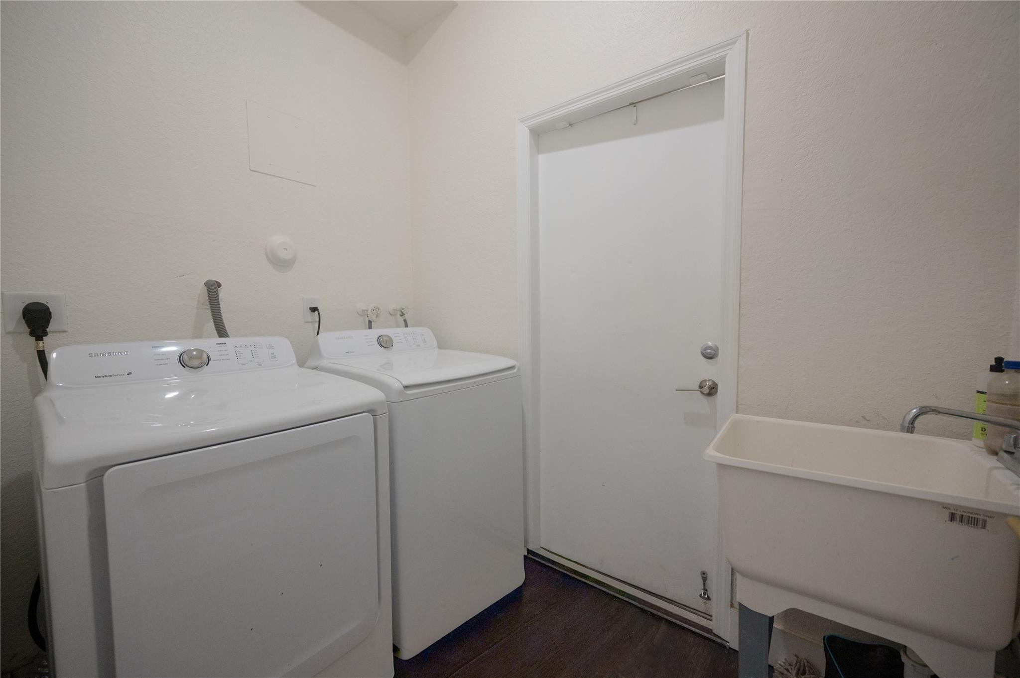 8891 Northwest 178th Lane Hialeah, FL 33018 - Photo 38 of 42 a utility room with dryer and washer