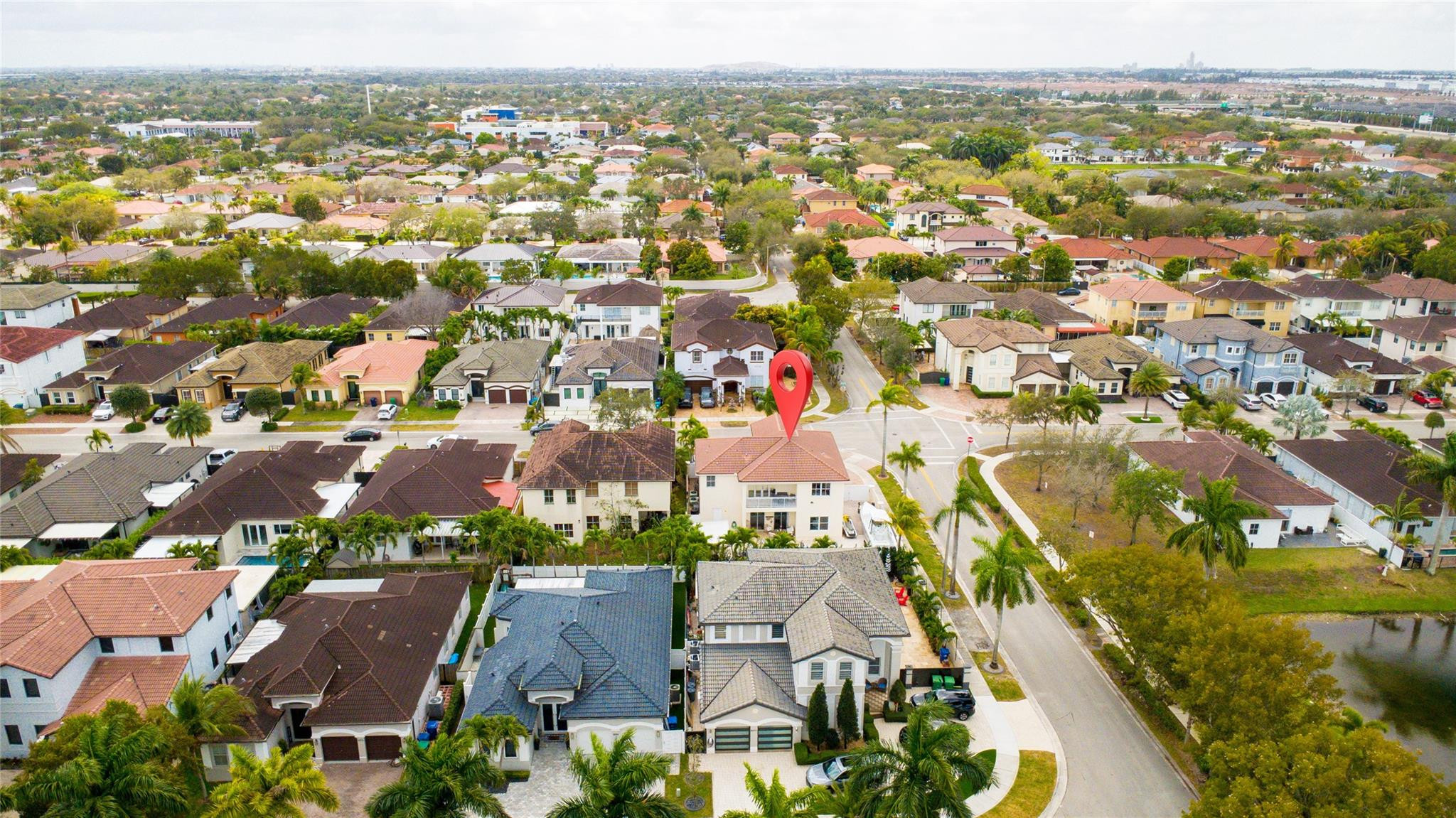 8891 Northwest 178th Lane Hialeah, FL 33018 - Photo 40 of 42 an aerial view of residential houses with outdoor space