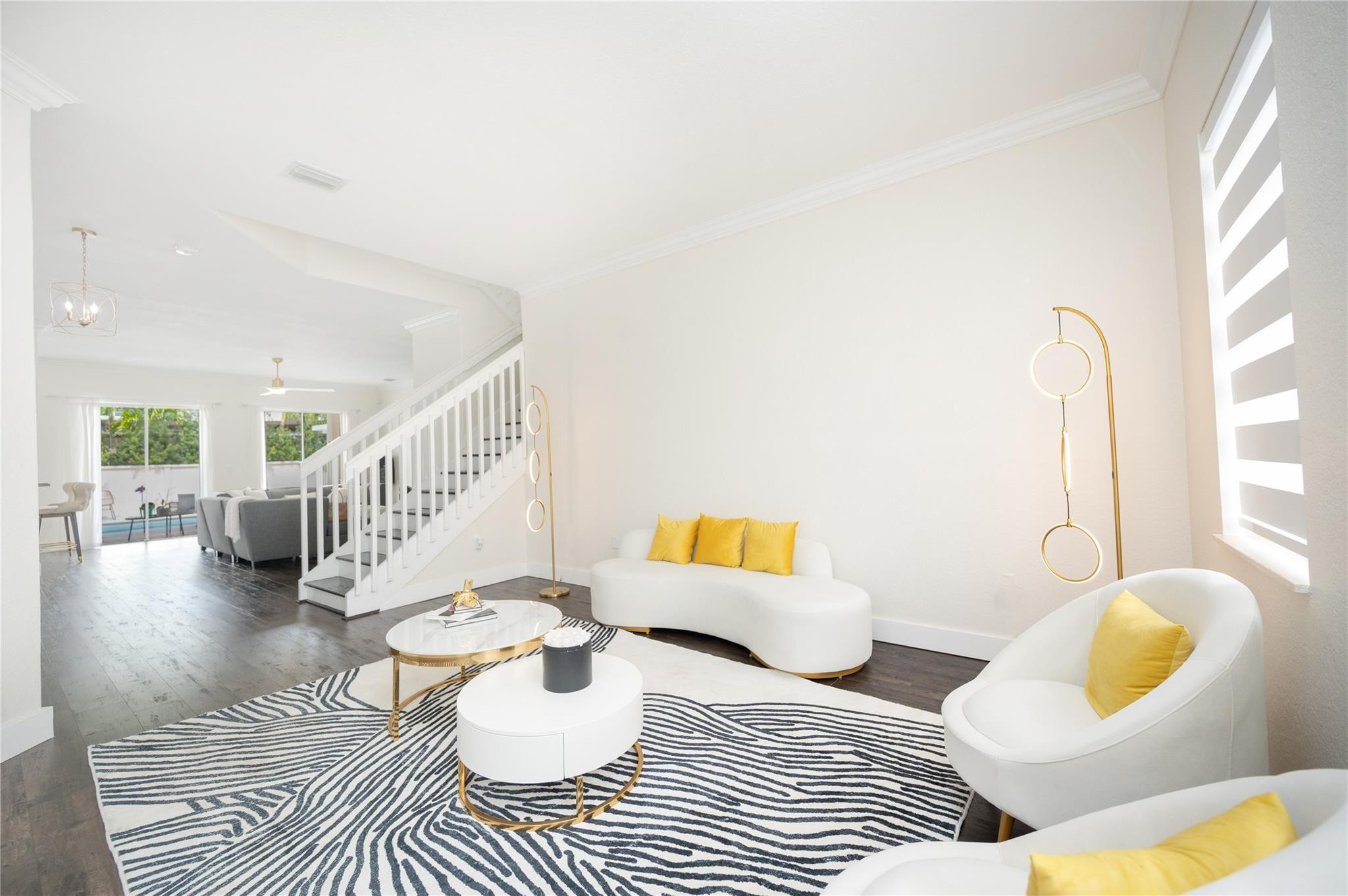 8891 Northwest 178th Lane Hialeah, FL 33018 - Photo 5 of 42 a living room with furniture and wooden floor