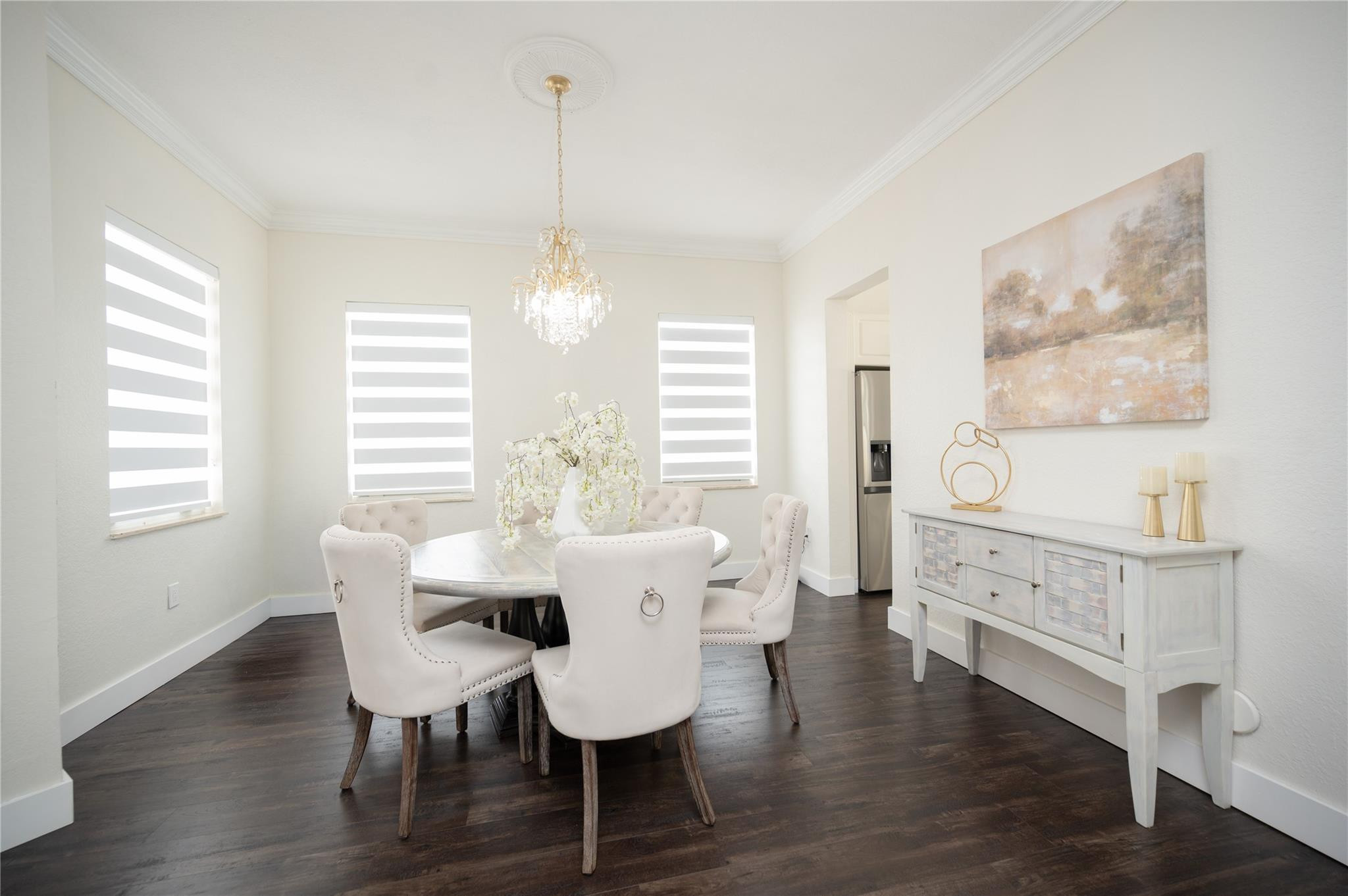 8891 Northwest 178th Lane Hialeah, FL 33018 - Photo 7 of 42 a view of a dining room with furniture window and wooden floor