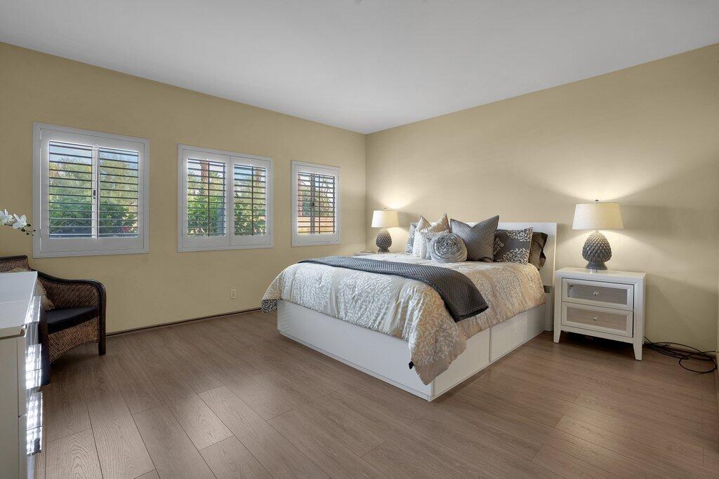 9 Lakeshore Drive Rancho Mirage, CA 92270 - Photo 14 of 41 a bedroom with bed and window